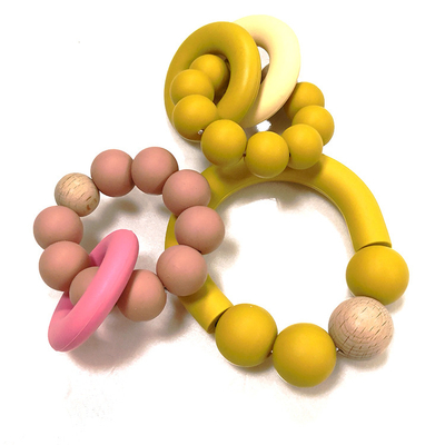 Balita silikon Beads Teether BPA Bebas Teething Rings Logo Disesuaikan