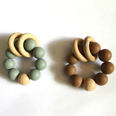 Manik-manik Silikon Kustom Teether 9*7.5*4cm Dengan 2 Gelang Kayu