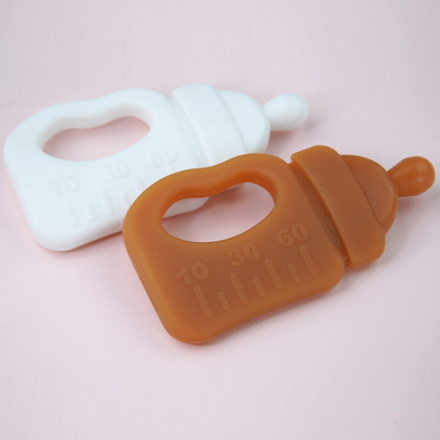 FDA BPA Gratis Produk Bayi Silikon Botol Susu Teether Toy 10.5*5.5*1.5cm Dengan Kotak